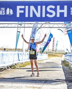 Winner Charlotte crosses the finish line in Race to the Stones in July 
