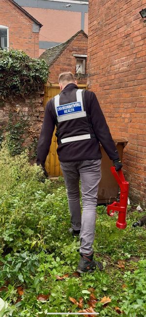 An Environmental Health officer from Lichfield District Council during the operation.