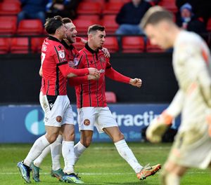 Taylor Allen celebrates his goal in Walsall's clash with Barrow
