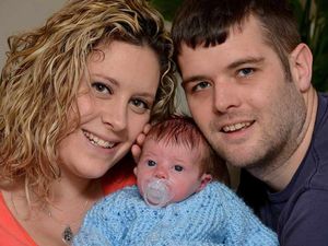 Supporting image for story: Baby Josh arrives in hurry as mother gives birth on pavement outside hospital