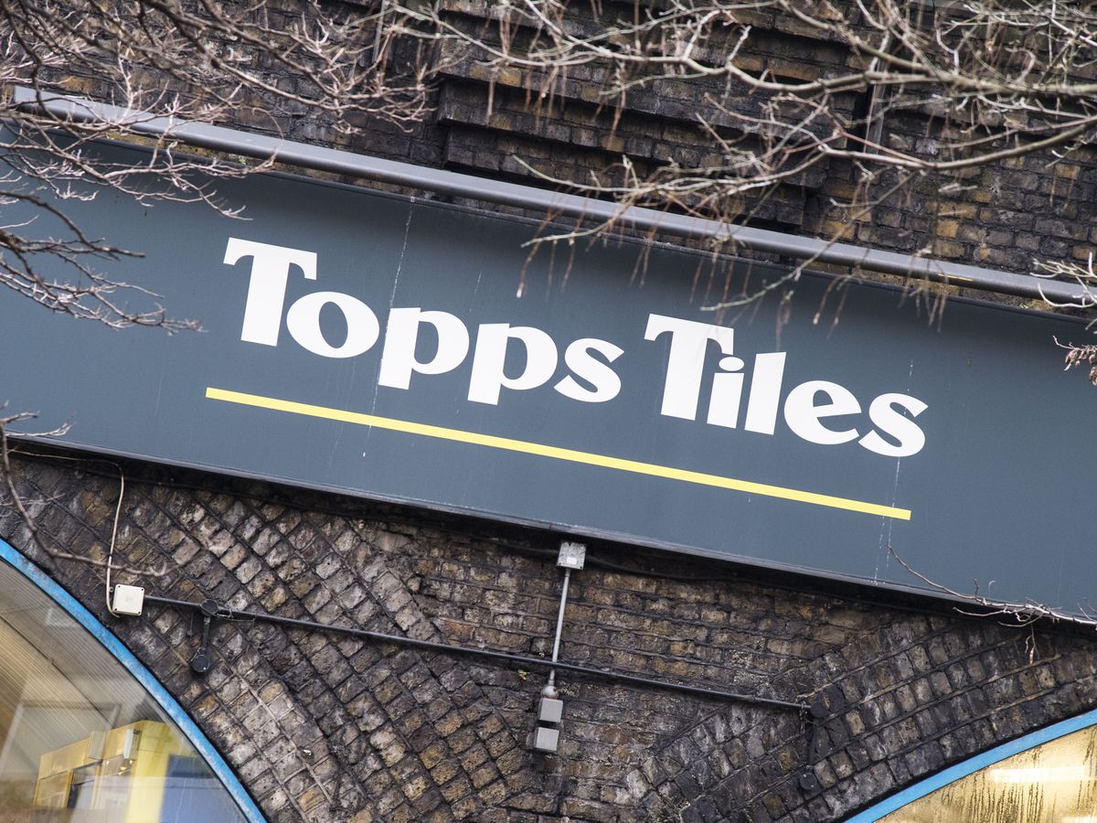 Topps Tiles buys Fired Earth brand from administration as sales growth slows
