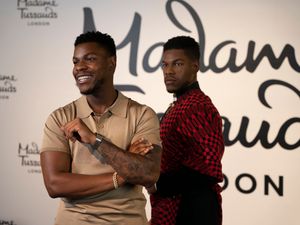 Supporting image for story: John Boyega unveils waxwork at Madame Tussauds in London