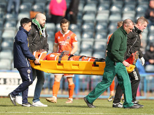 Supporting image for story: Toto Nsiala suffers fractured cheekbone in Shrewsbury Town defeat