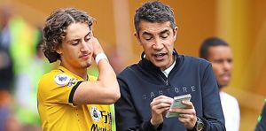 Bruno Lage and Fabio Silva of Wolverhampton Wanderers on the sideline during the Premier League match between Wolverhampton Wanderers and Brentford at Molineux on September 18, 2021 in Wolverhampton, England. (Photo by Jack Thomas - WWFC/Wolves via Getty Images).