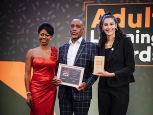 Karl Wilson presented with his award by hosts Nicola Beckford (Left) and Santina Bunting. PIC: WMCA