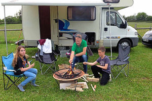 The Youll family relax alongside the funbus