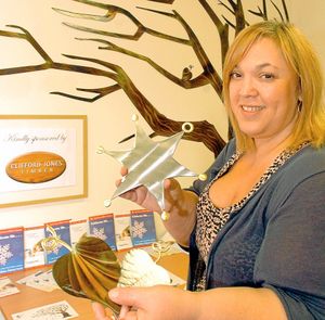 Simi Epstein, director of fundraising at Hope House Children's Hospice in Morda near Oswestry, with the tree of hope at the new counselling centre at Hope House.
WITH WORDS SUE FOR STAR AND OSWESTRY BORDER CHRON..
PIC BY SIMON WILLIAMS