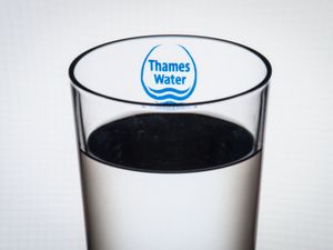 Thames Water logo on a glass