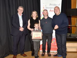 Supporting image for story: Binmen honoured after striking up friendship with boy who offers them snacks