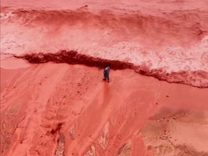 Supporting image for story: Rain creates crimson spectacle on Iran’s Hormuz Island