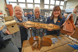 The group found its new location after launching an appeal for help. Pictured front left, Sheila Brown OBE founder of New Life, Shed chair David Shaw and Jo Walker from Cannock Chase Crem