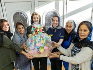 Supporting image for story: Knitting group hands over moving 'kindness hearts' for hospital's end-of-life care patients