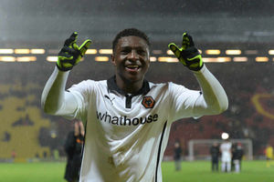 Kortney Hause of Wolverhampton Wanderers celebrates in from of the travelling fans at full time.