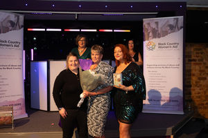 Jo Downing receiving the 2025 Inspirational Woman of the Year award