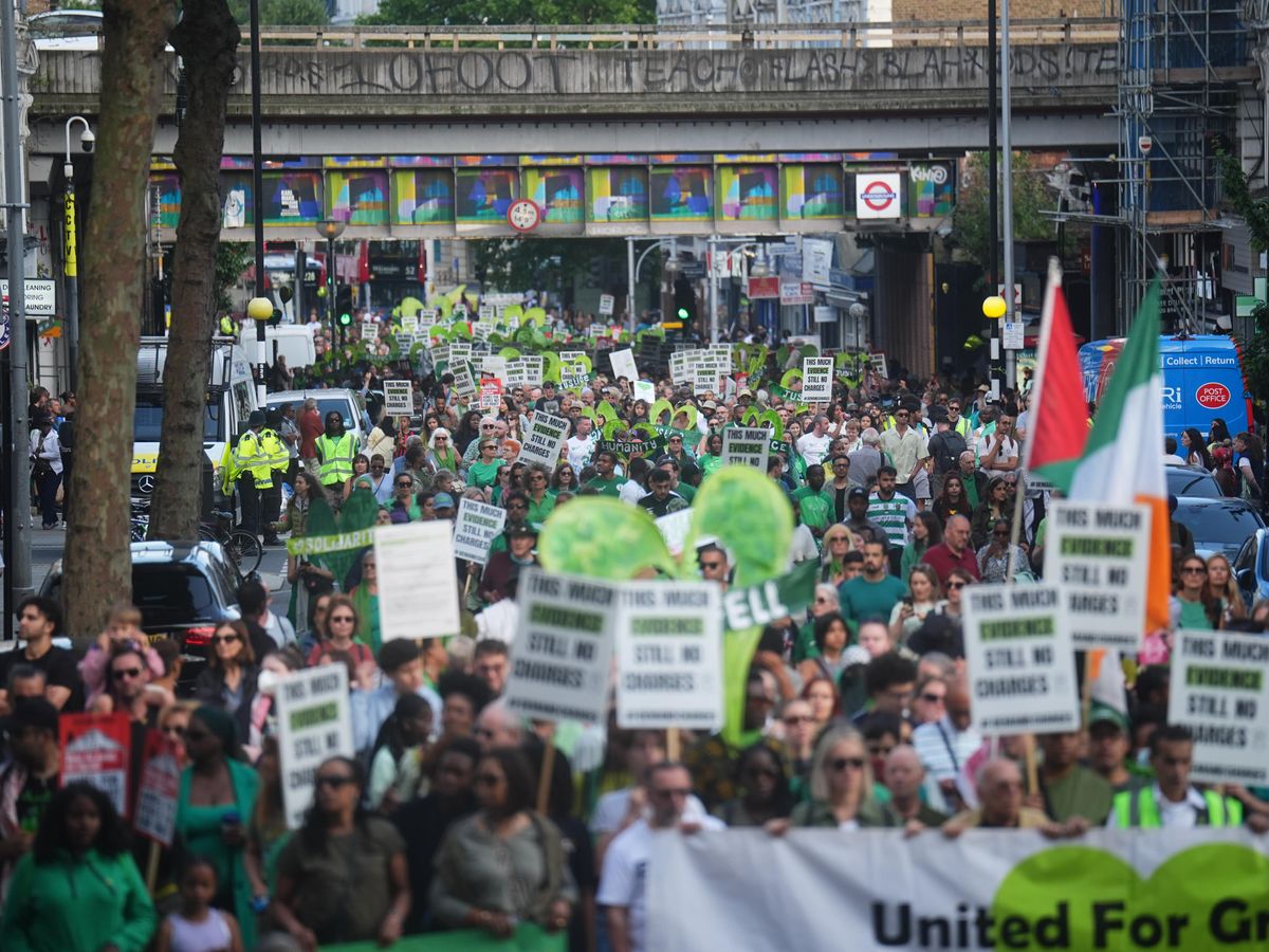 Shouts for justice at Grenfell anniversary march before tower demolition begins