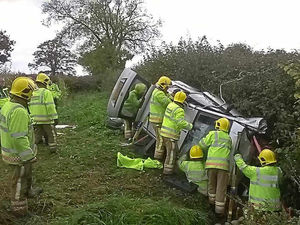 Supporting image for story: Driver wakes up to find his car stuck in ditch