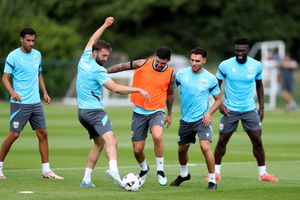 Midfielder Alex Mowatt (bib) getting stuck in against new defensive recruit Nat Phillips. (Photo by Adam Fradgley/West Bromwich Albion FC via Getty Images)