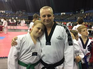 Jodie Cooper takes gold in a taekwondo hat-trick