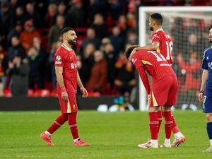 Liverpool’s Mohamed Salah (left), Curtis Jones and Cody Gakpo stand dejected after their side's loss to Paris St Germain