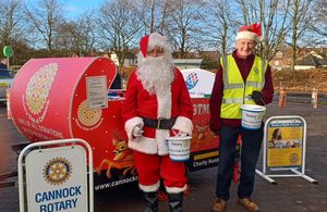 Santa with his Rotary Helper