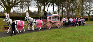 Loved ones follow the carriage