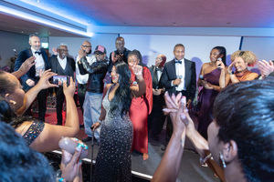 Beverley was joined by family on stage and off to honour Paul ‘Reidy’ Reid. Photo by Carol Bailey. 