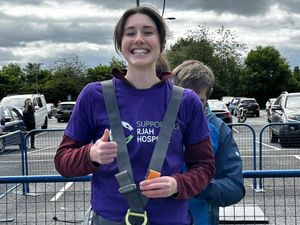 Supporting image for story: Shropshire lawyer braves 150-foot abseil drop for charity