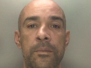 Supporting image for story: Armed robber who threatened shop worker with knife caught after leaving hand print