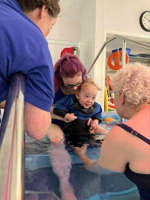 Theo enjoying his swim in the pool