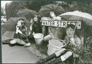 Children in Water Street, Chase Terrace, waiting patiently for rain: Lindsey Fisher, 10, Elizabeth Heath, 8, Susan Fisher, 8, Christine Heath, 13, and Sharon Fisher, 6.