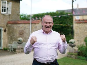 Ed Davey, with clenched fists, celebrates local election results