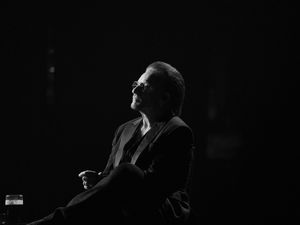 A silhouette of Bono