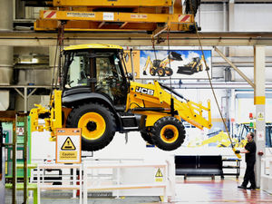 Supporting image for story: JCB annual sales and profits fall