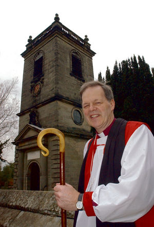 The bishop is pictured here in 2004 outside the recently repaired Ingestre Church, in Ingestre, Stafford, where he was leading a service to re-dedicate the church