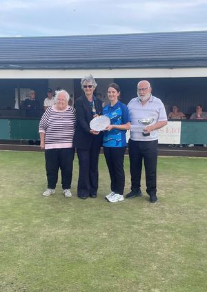 Champion presentation – British Ladies President Janice Wilson hands the trophy to Sally King watched by sponsors Pat and John Crowther