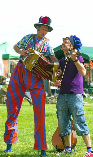 The Melomanics folk band Tim Lean and Rich Pharo 
playing to crowds at Attingham Parks spring fair