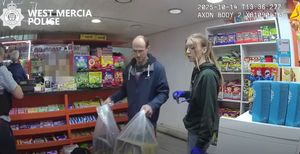 Goods being bagged up during the operation. Picture: West Mercia Police