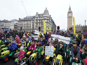 Supporting image for story: Farmers in tweed, children on toy tractors and celebrities join London protest