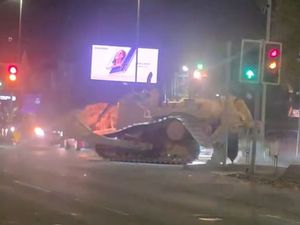 Supporting image for story: See the moment stolen earthmover smashes past lorry on Wolverhampton dual carriageway before driver is arrested