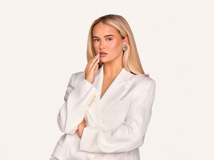 Molly-Mae Hague in a white jacket