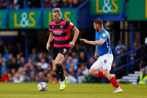 Sam Cosgrove of Shrewsbury Town and Ryan Tunnicliffe of Portsmouth. (AMA)