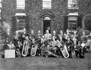 Coalbrookdale Brass Band, July 30, 1932. Picture shared by Miss June Culling. Her late uncle Frank Hanley, who lived in Ironbridge all his life and was born in 1897, is on the back row, standing, third from right. Miss Culling knew he played in Jackfield Brass Band but was unaware that he played in Coalbrookdale Brass Band. Miss Culling says her uncle worked at Ironbridge Power Station.