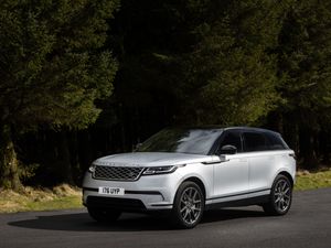 Supporting image for story: First Drive: Updated Range Rover Velar has added appeal with interior tech and hybrid engines