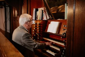 Johnathan Lloyd with the organ