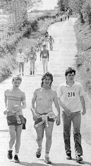 The Bridgnorth Walk of 1986. The picture caption reads: 'The long and winding road back to Bridgnorth for these weary charity walkers at Underton.'