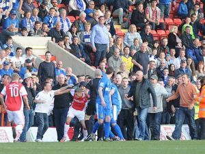 Supporting image for story: Play suspended in crowd trouble at Kidderminster Harriers v Stockport