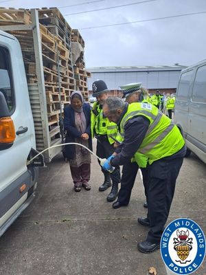 A colleague from the HMRC fuel testing unit showing his checks to officers and Cabinet Member for Public Health and Communities at Sandwell Council, Syeda Khatun.