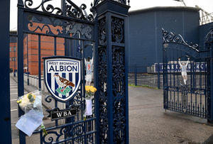 Tributes have been left at the front gates to Mark Townsend