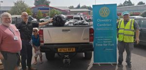 Mike Mobach, Cath Baldry, Jim Griffiths with the loaded truck