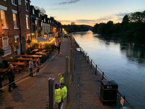 Supporting image for story: Flood barriers go up in Bewdley after heavy rain causes River Severn to rise